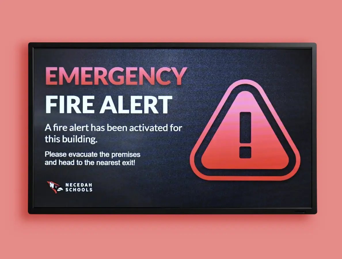 A large TV display with an emergency alert