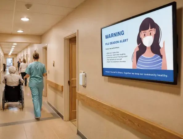 Emergency alert digital signage in the hallway of a senior facility center