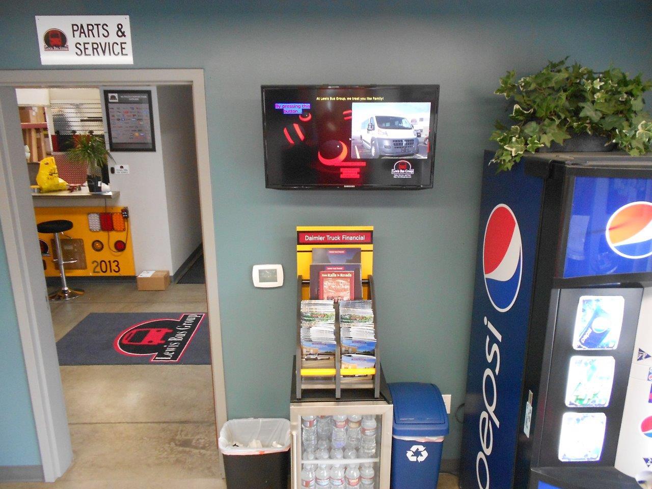 digital signage display in Lewis Bus Group office