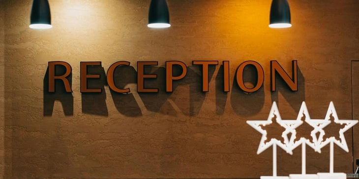 The reception sign is in the lobby.