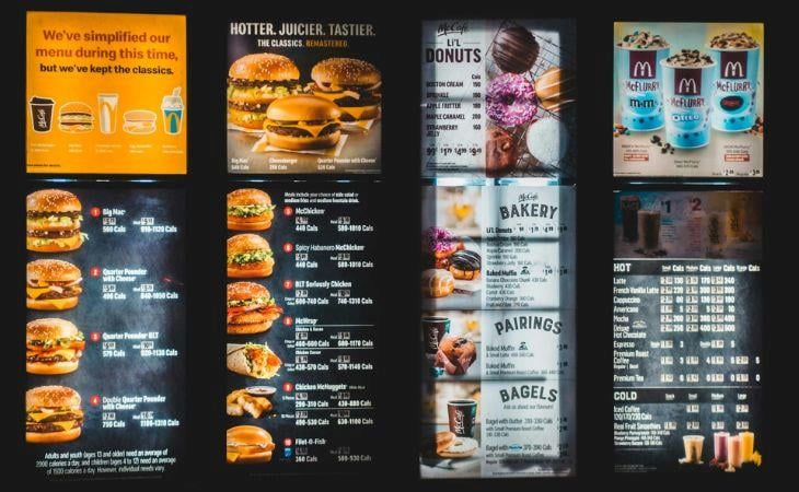 Image Alt Tag: Four digital signage screens at McDonalds.
