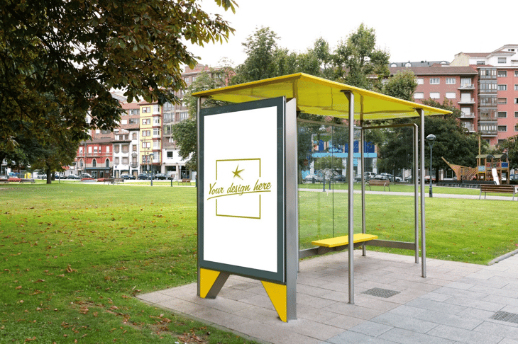 Large digital sign in a bus station with high foot traffic.