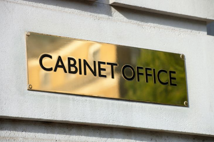 A cabinet office identification wayfinding sign.