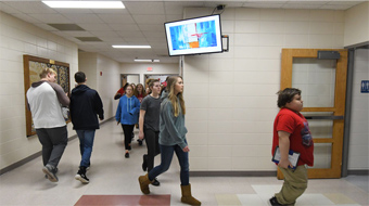 students walking to class in hallway