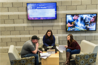 student lounge with digital signage operating