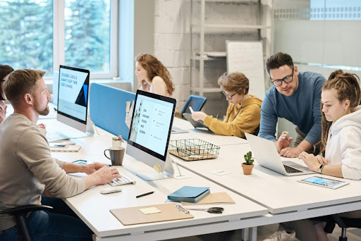 Employees using apps to customize content with digital content.
