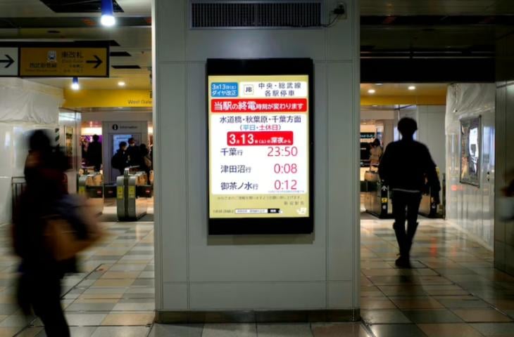 Subway digital signage that changes content at different times of day.
