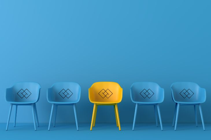 Chairs each with a company logo.