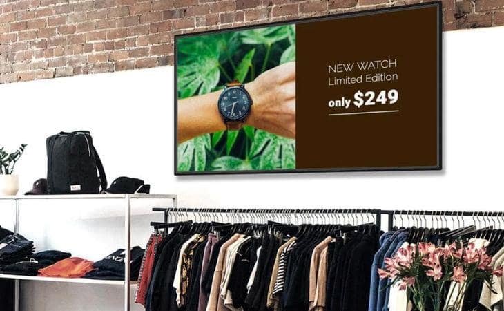 Digital signage inside a local fashion store introducing a new watch edition.