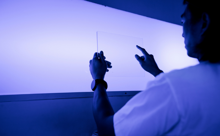 man checking error after digital signage installation