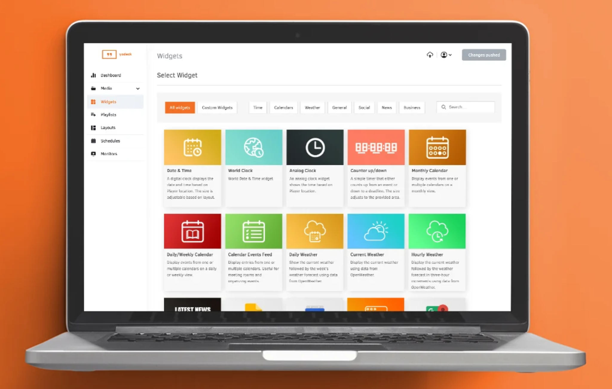 An orange background with a laptop and a landing page