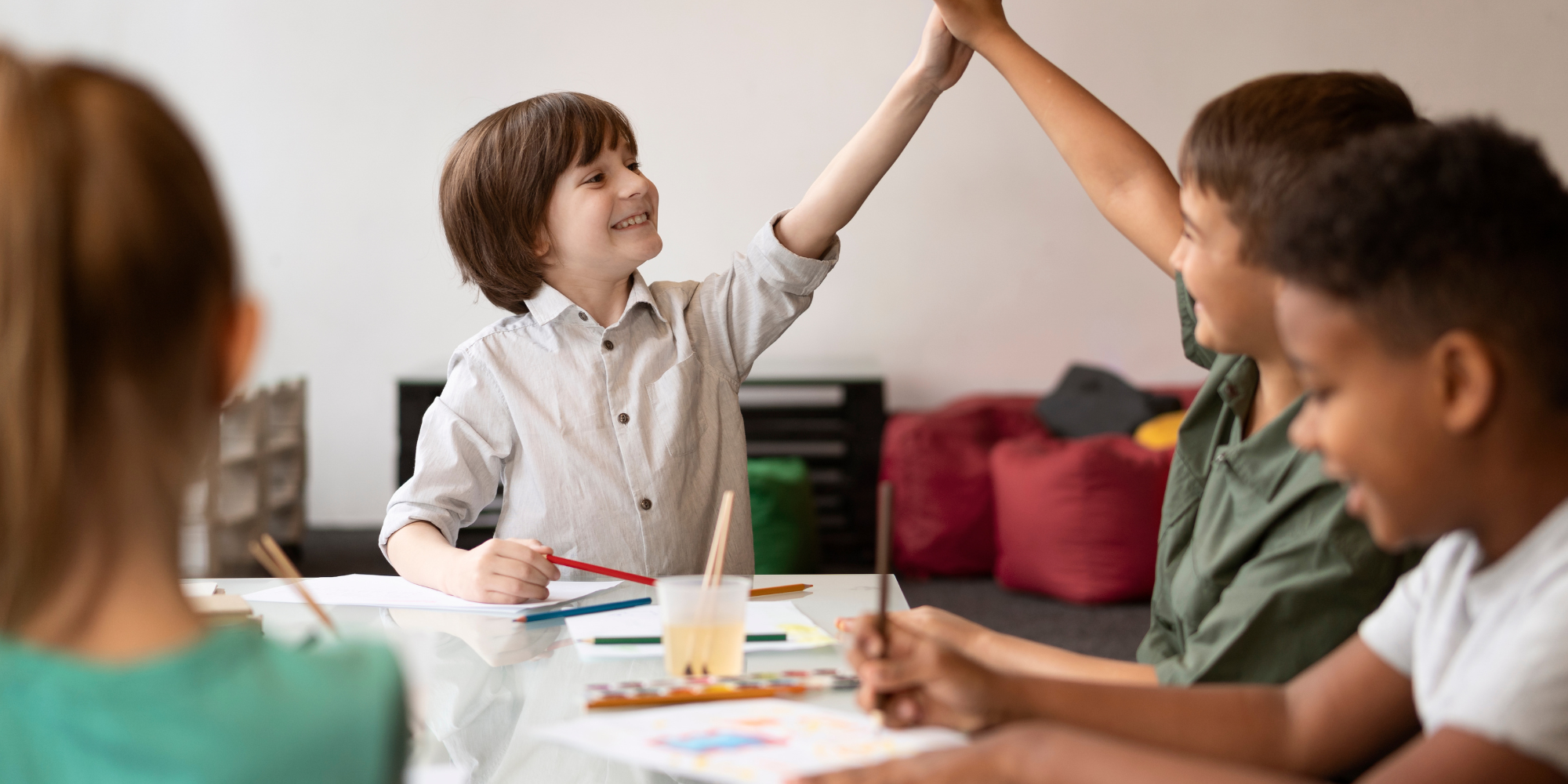 Children showing a happy classroom environment