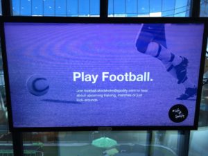 Digital signage advertising corporate events at Spotify.