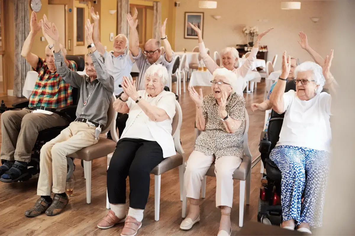 Seniors engaging in an activity in a senior home facility with digital signage