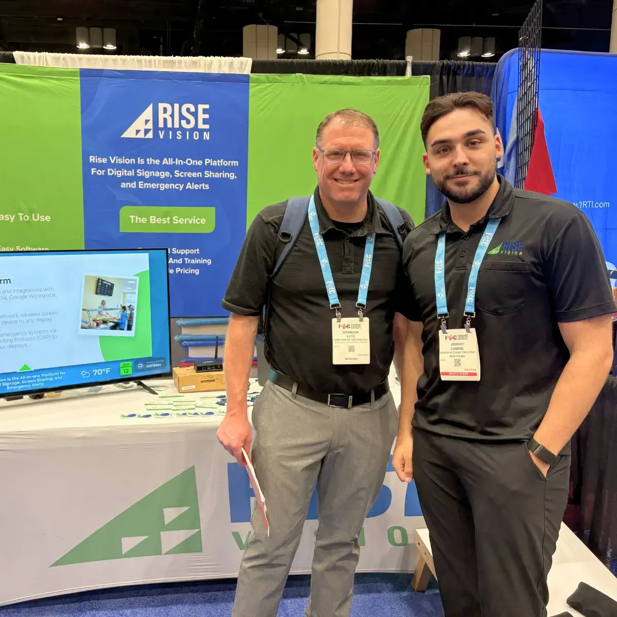 Johnny and a happy customer at FETC