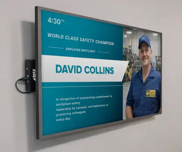 Digital media player mounted behind display