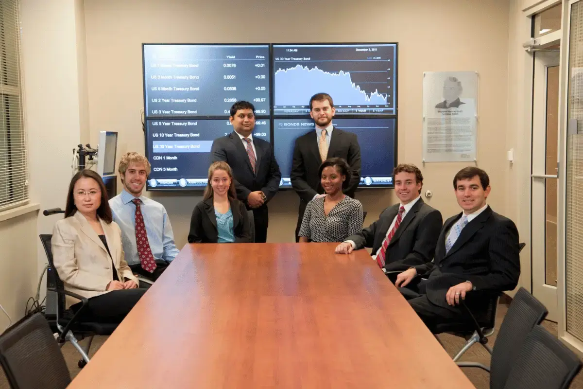 A board meeting with digitial displays in a local financial services bank