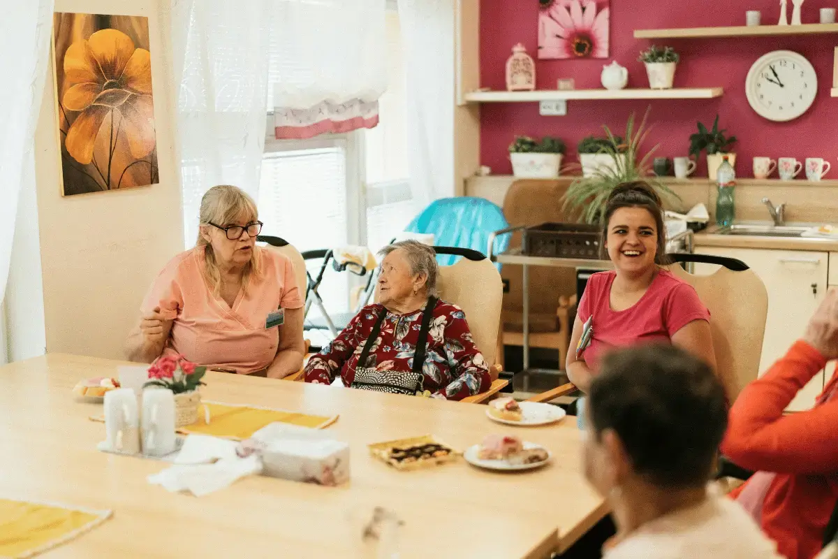 A family visiting their senior at a senior facility