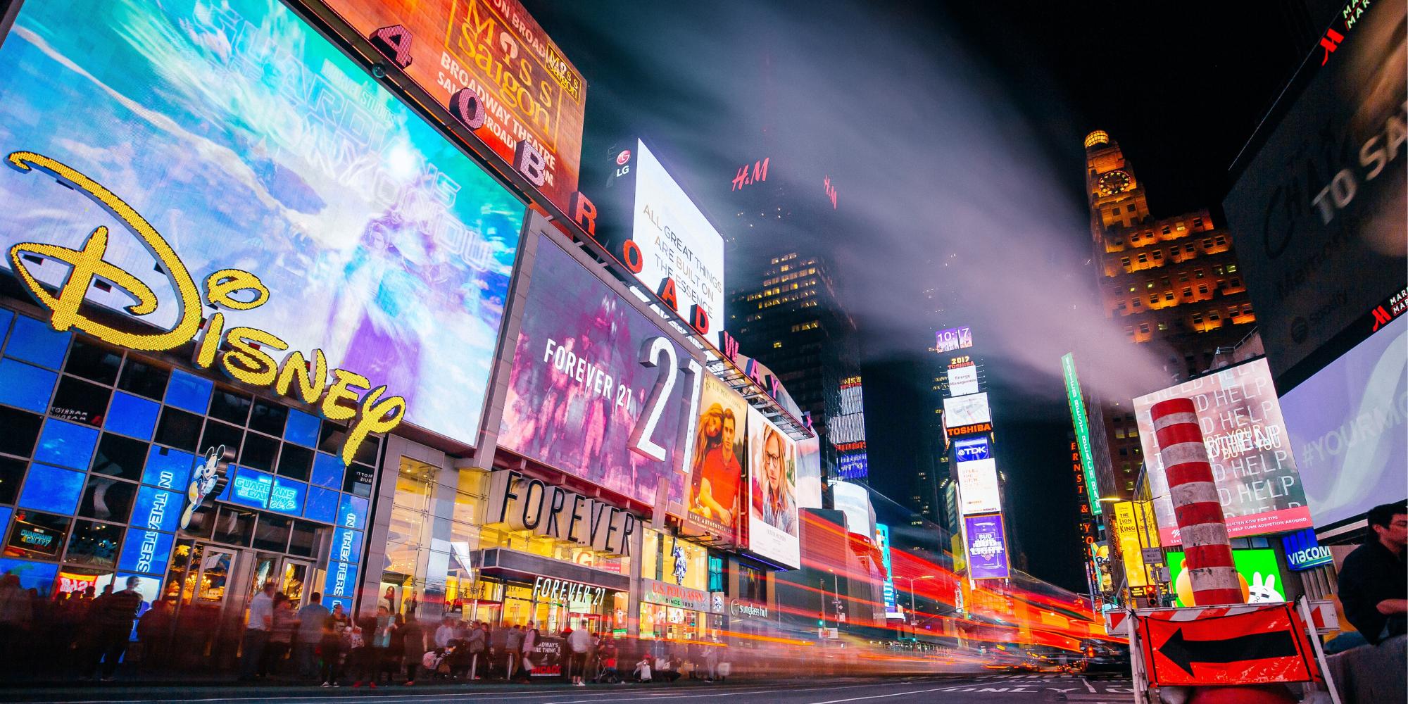 Buildings with large digital displays.