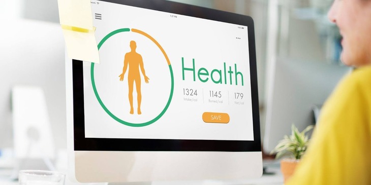 Woman looking at signage that promotes health.
