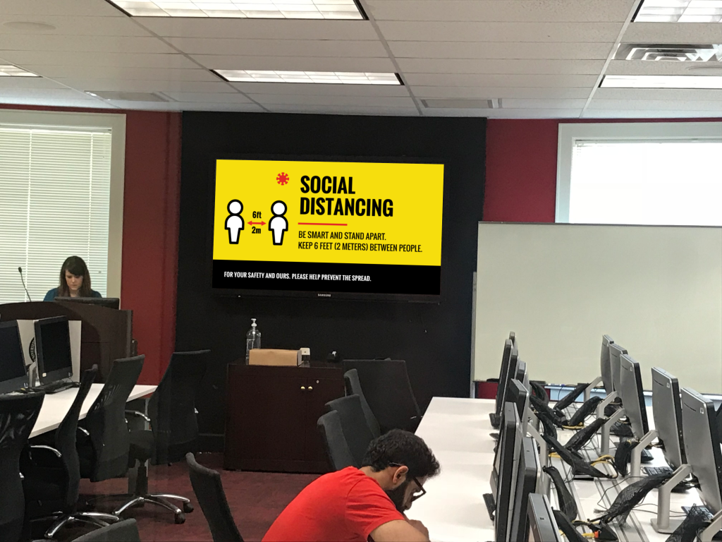 Office social distancing digital signage.