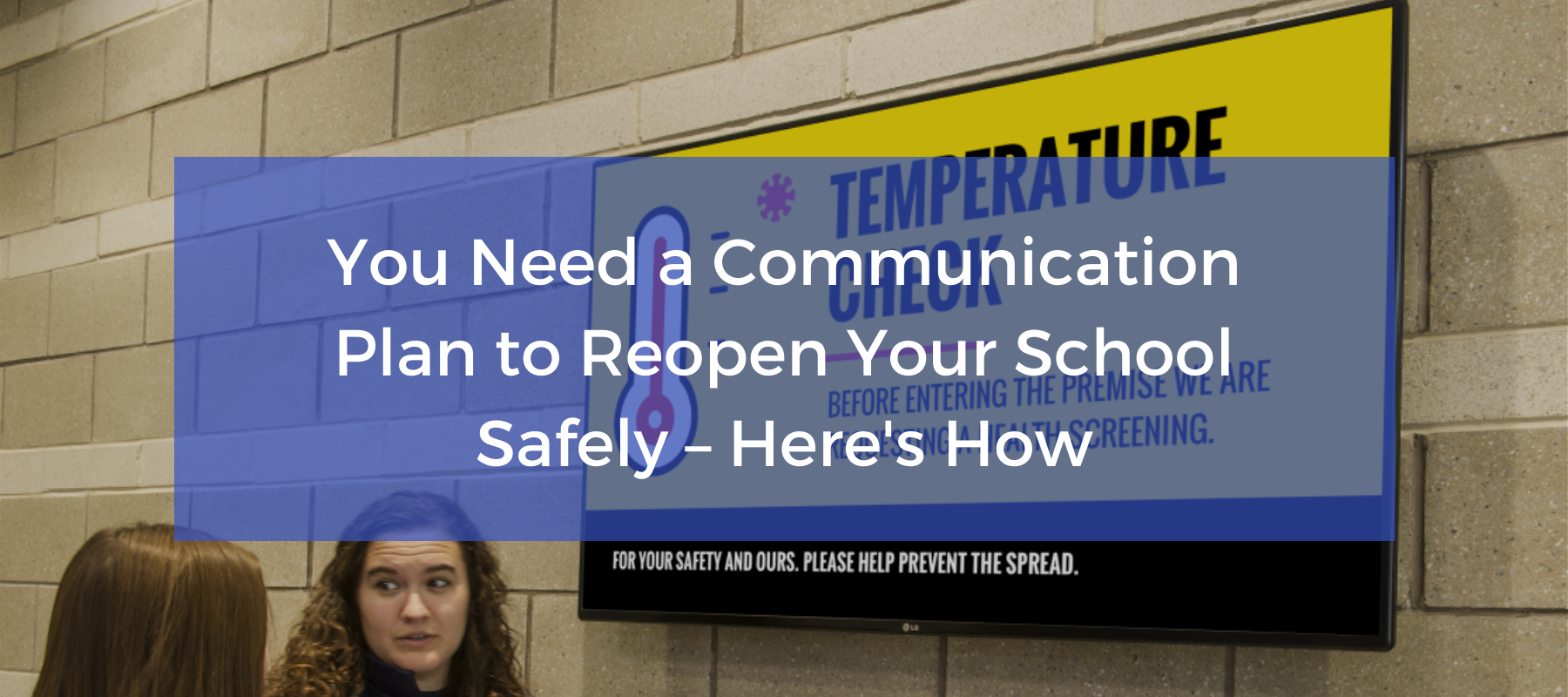 Woman in front of temperature scanning safety sign
