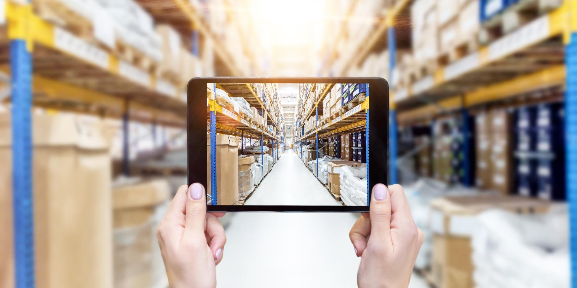 A photo of a warehouse with racks and inventory.